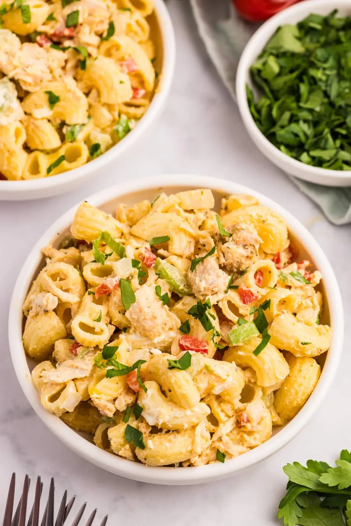 This chicken macaroni pasta salad is a little more filling than the classic version everyone knows. Adding canned chicken turns it into a hearty side (or light meal), and the creamy dressing is one of those can’t-stop-eating situations. It’s easy to make ahead, travels well for potlucks, and tends to disappear fast with both kids and adults.