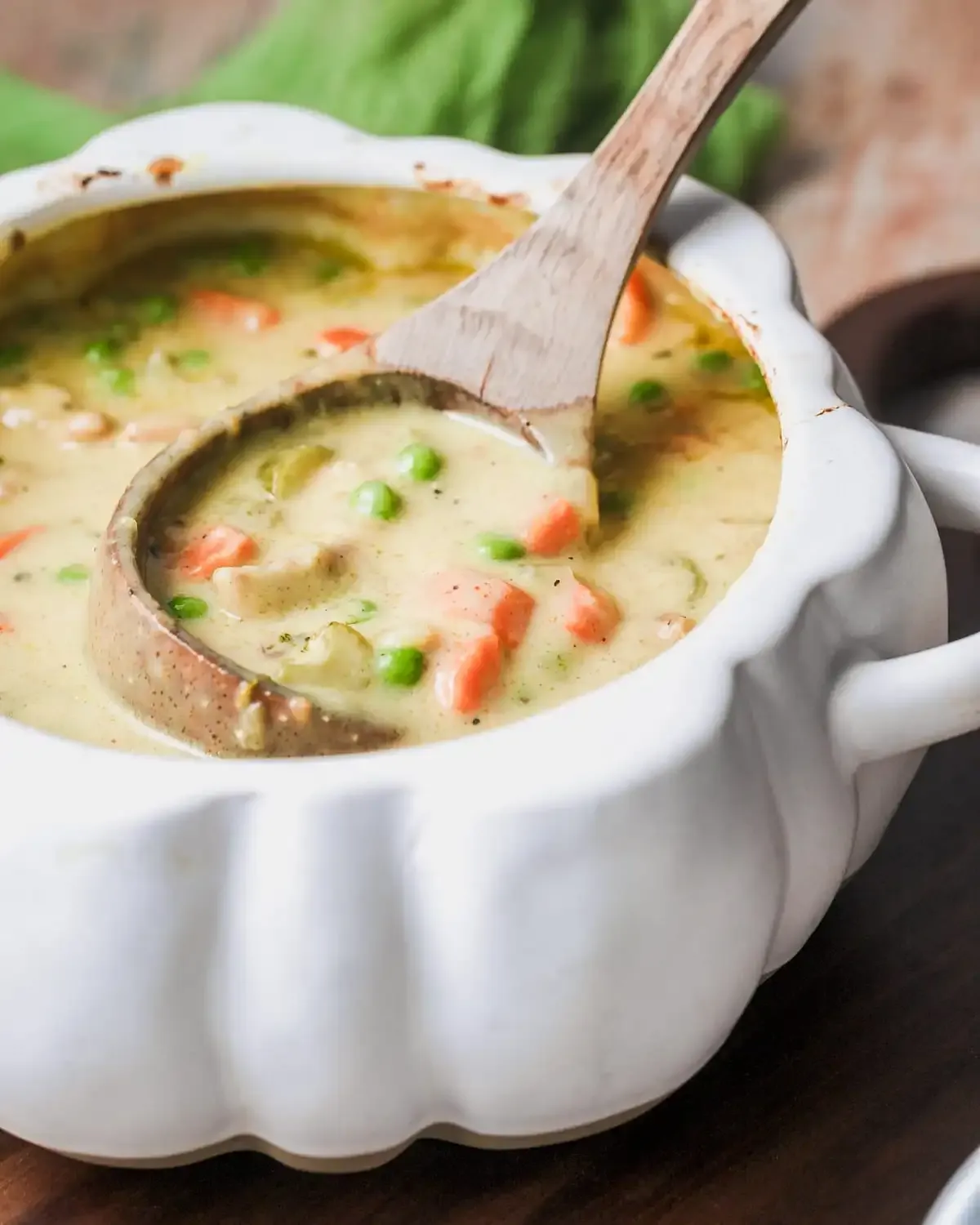 This is basically chicken pot pie in its coziest, comfiest form — all the creamy, savoury filling you love, but cooked in one pot for maximum ease. Juicy chicken thighs, tender veggies, and a rich, velvety broth come together fast, making it perfect for busy weeknights. And the best part? The crust bakes separately, so it stays crisp and buttery and you can pop a piece on top of every bowl. Total comfort without the fuss.